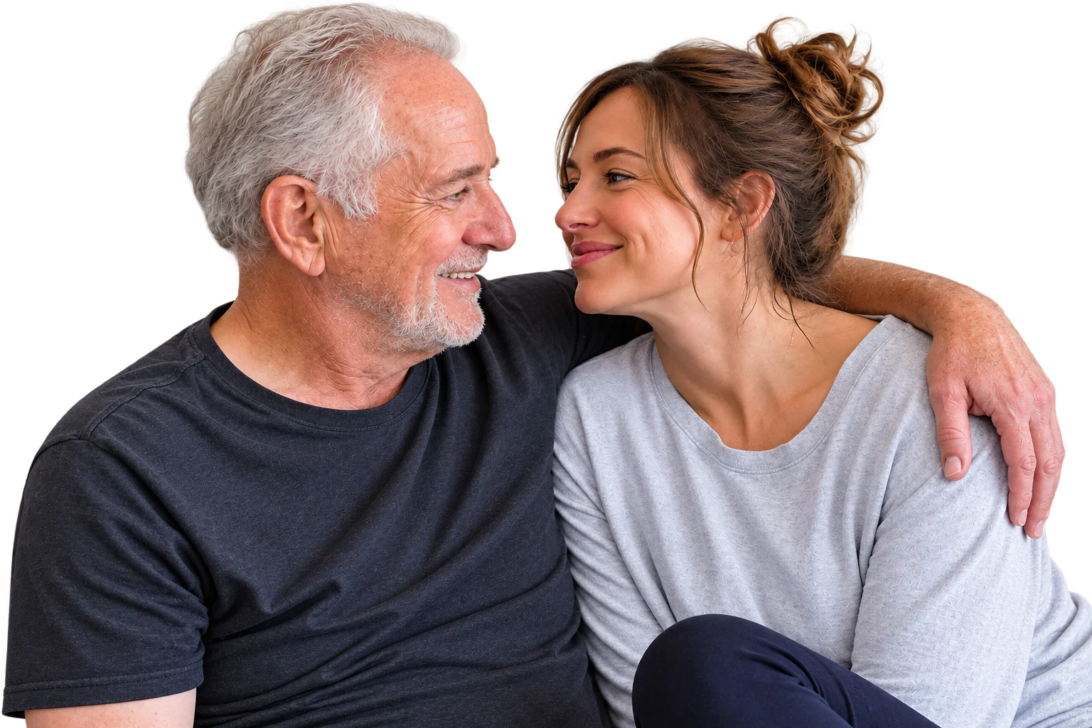 An older man in his sixties beside his partner, a woman in her thirties